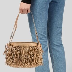 Hogan fringe shoulder bag. Leather/suede.  Open top.